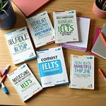 Top-rated IELTS preparation books on a desk