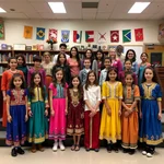 Students in traditional attire at school cultural event