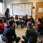 Students discussing ethical dilemmas in classroom