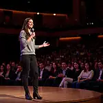 Friend giving a speech at a public speaking event