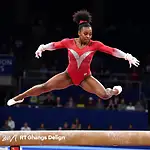 Simone Biles executing a complex gymnastics move