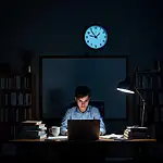 Student working late at night at desk