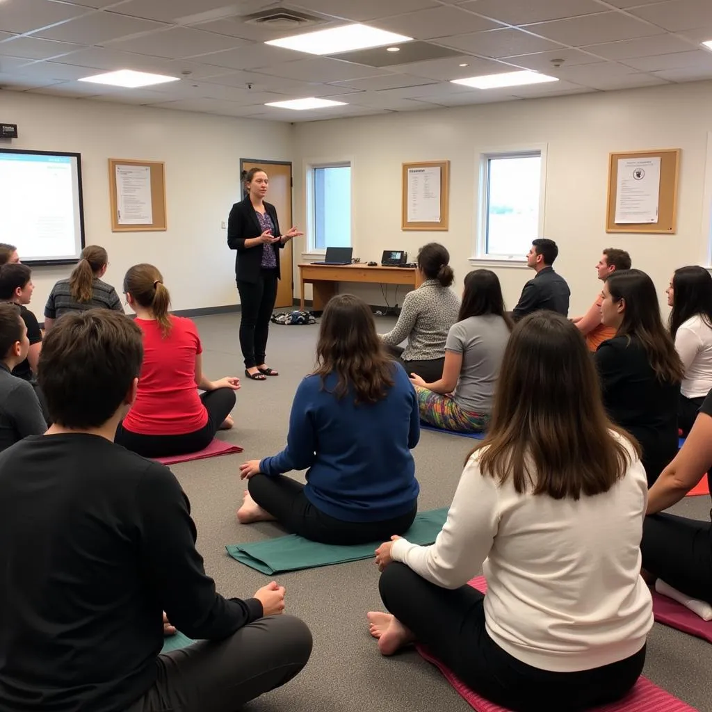 Teachers learning meditation techniques in a workshop