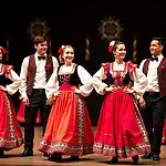 Traditional dancers performing in colorful costumes