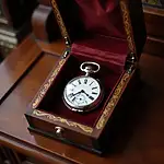 Antique silver pocket watch in custom display case