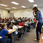 Students participating in a disaster preparedness drill at school