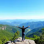 Nature lover enjoying scenic view of mountains