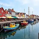 Picturesque harbor of Seahaven with colorful fishing boats