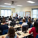 Students using computers in a modern classroom