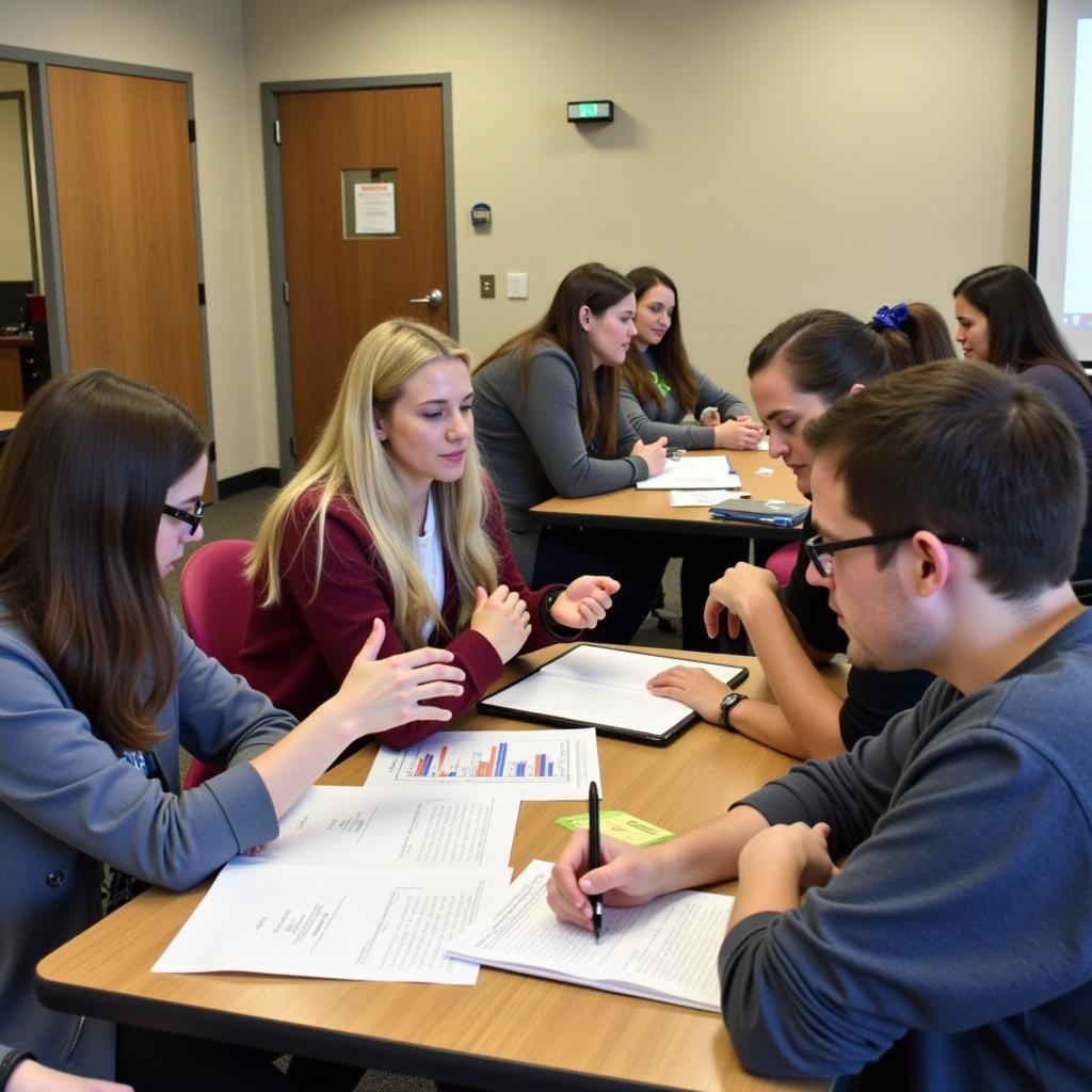 Teachers collaborating in professional development workshop